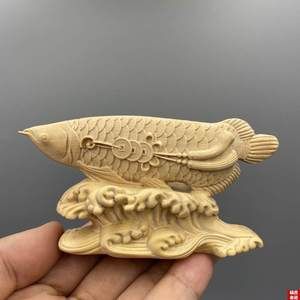 金龍魚雕刻，金龍魚雕刻在中國文化中有什么特殊的象征意義和象征意義？